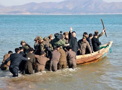Kim Jong Un waves to shore as he leaves for America to deliver a death blow
