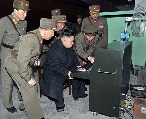 Kim inspects latest technology. With the click of a mouse he can now watch 'Here Comes Honey Boo Boo in his armored car